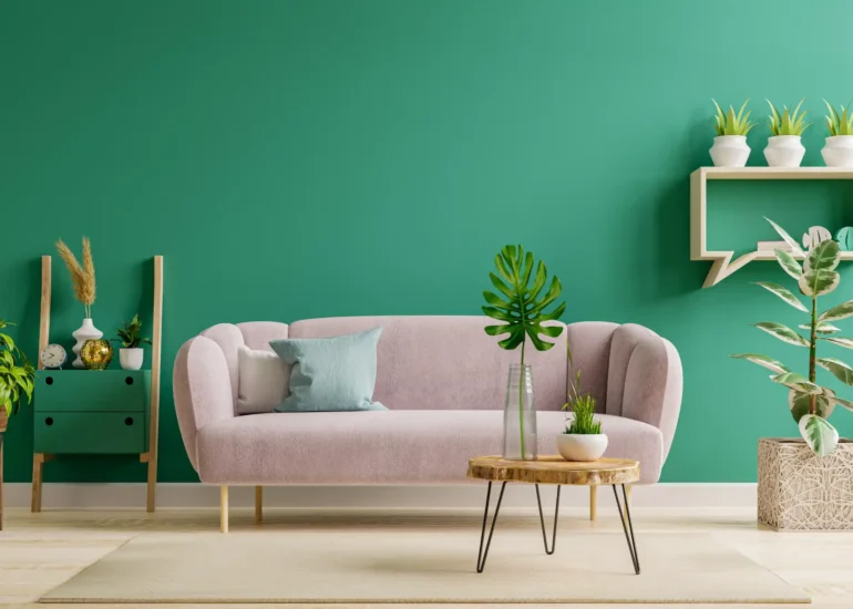 green interer and light pink sofa